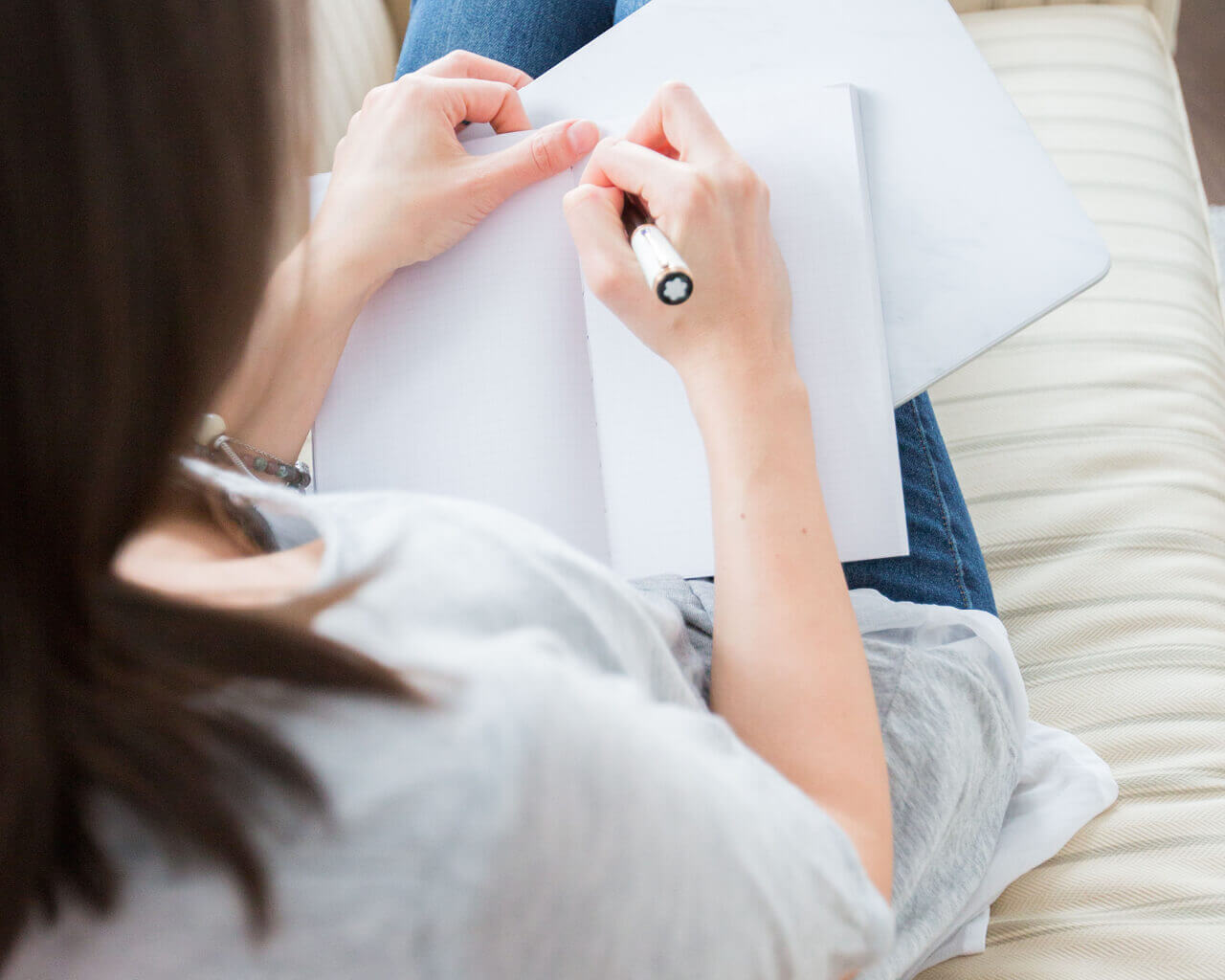 girl writes in her journal